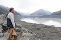 A man at Tasman Glacier viewpoint, Aoraki / Mount Cook National Park, New Zealand